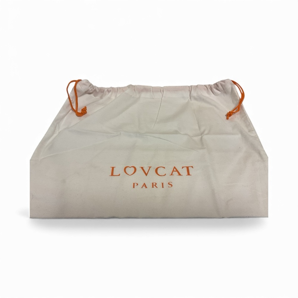 Lovecat Paris dust bag 
Cream with orange Lovecat Paris logo on the front